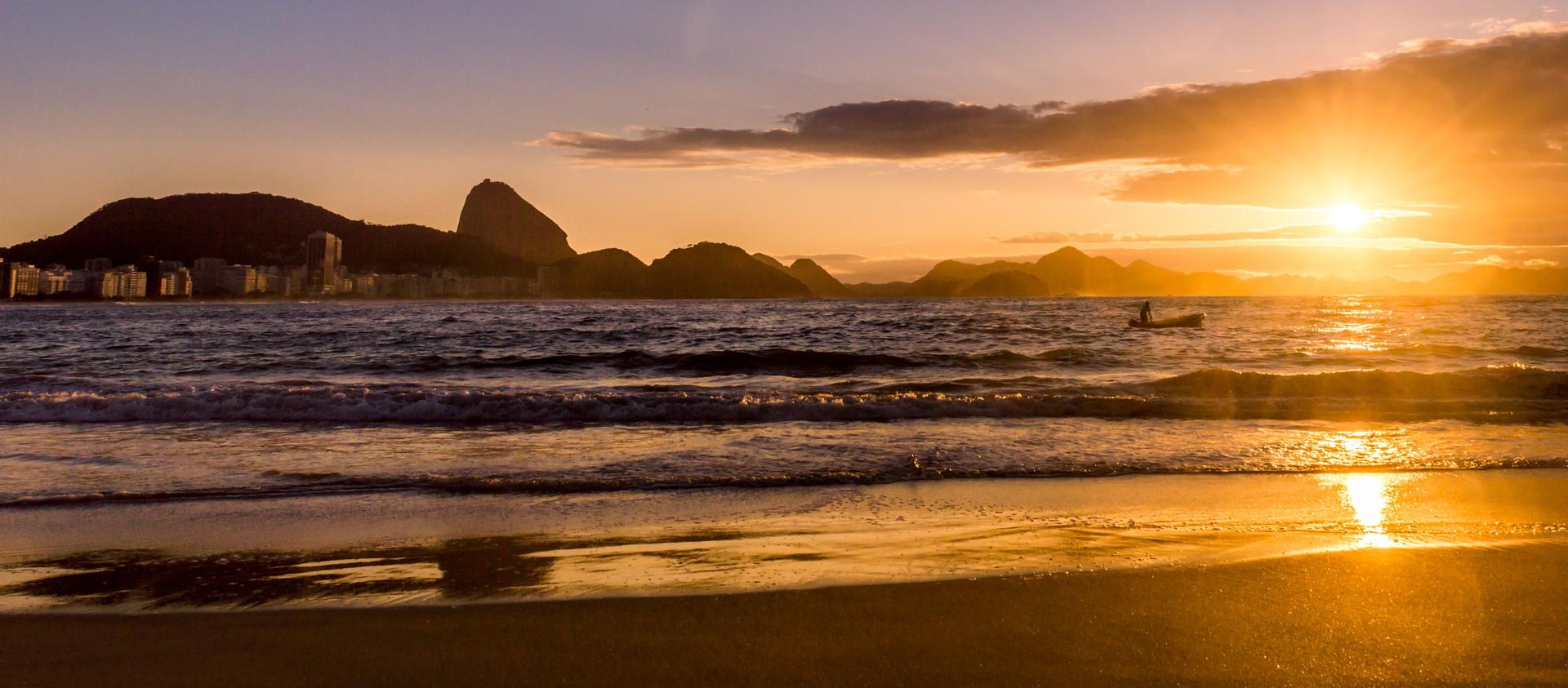 Idyllic sunrise in Copacabana Beach in Rio de Janeiro, Brazil